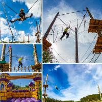 Seikkailupuisto Laajavuoren erilaisia aktiviteetteja − yläköysiratoja, pomppulinna ja trampoliini